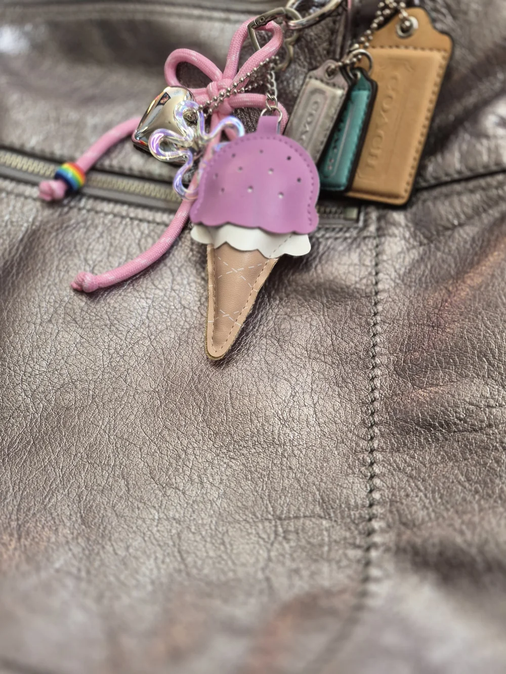 Coach sleek metallic